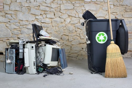 Professional rubbish removal van parked in a residential area