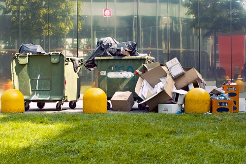 Scheduled rubbish collection in a commercial area of Upper Clapton